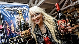 Reflections of Darkness - Music Magazine - DORO - Reigning Metal Queen Launches Signature Champagne & Wine